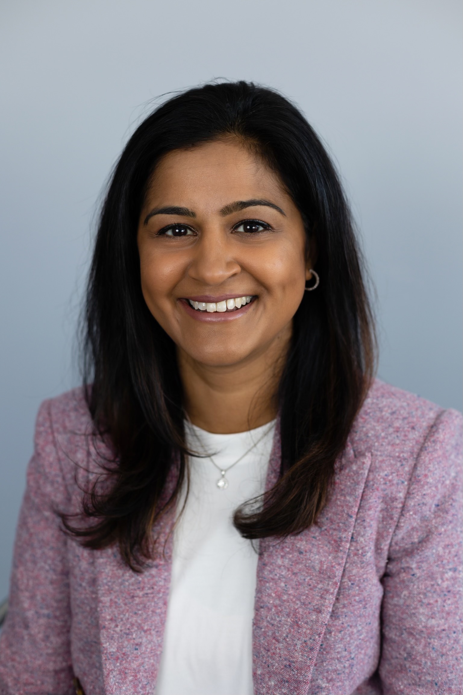 ReemaHeadshotPinkBlazer Reema Gupta Sethi MD, Aura Health & Spa in Plymouth, Michigan